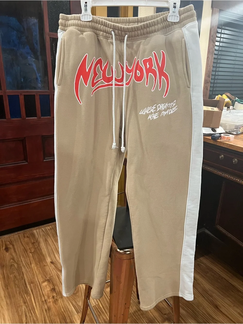 Fashion Nova Beige Joggers with Red 'New York' Graphic and White Side Stripe